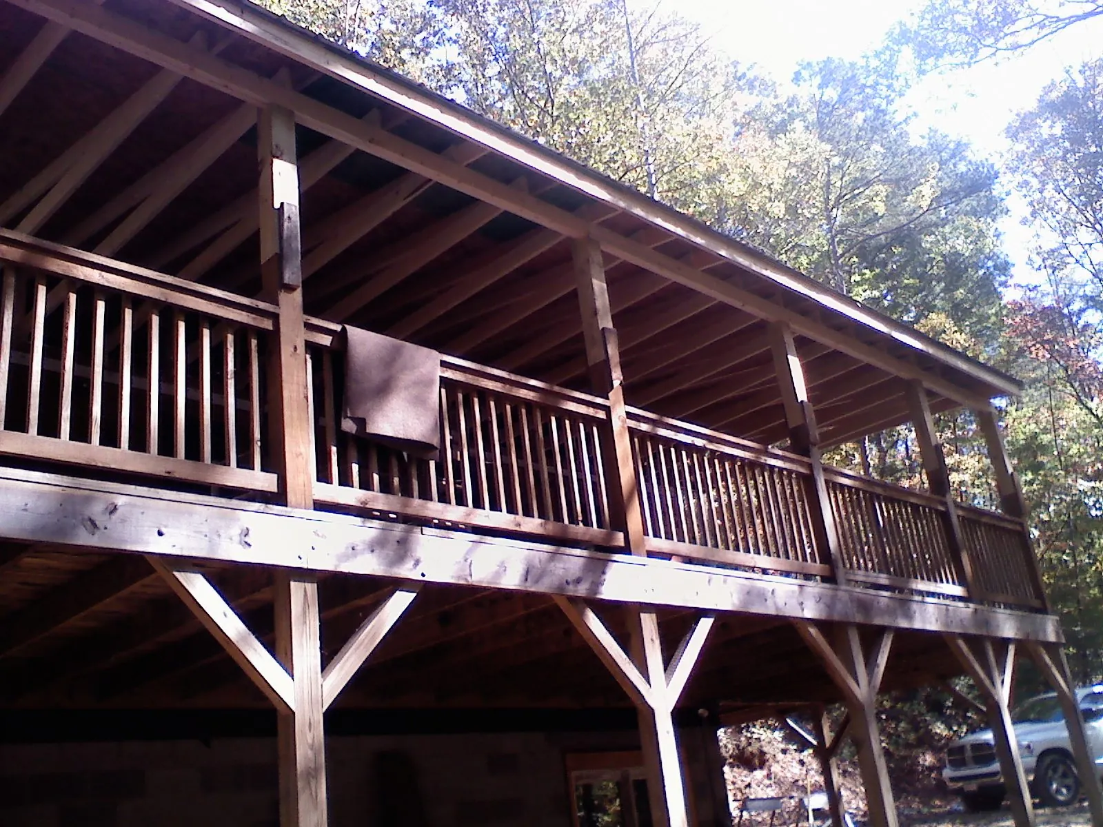 Timber framing under a new elevated porch and deck — Roof Leak Repair in Rosenberg by Roofing Brothers